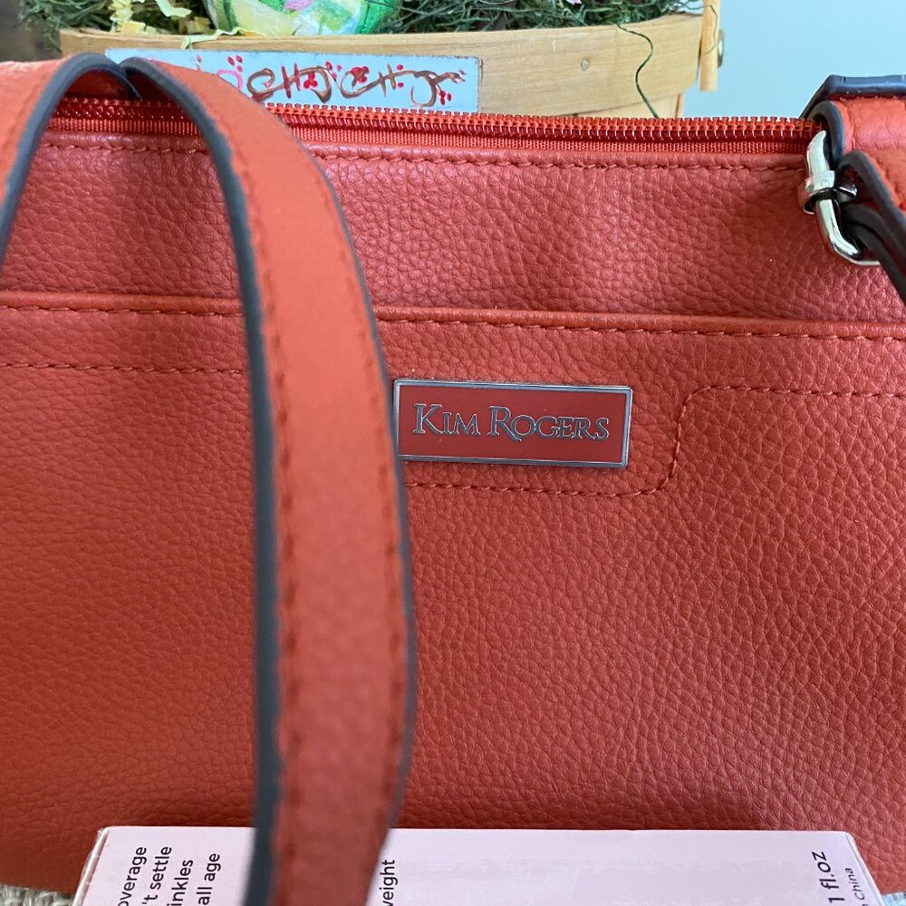 Gently used one time. Rust color both zipper top and snap closed bag w/strap - Picture 3 of 4